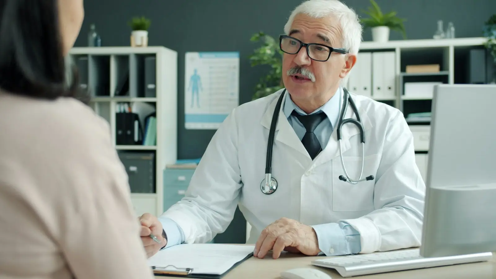 A doctor in consultation with a patient